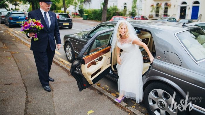 Lucy stepping out of the Bentley Arnage with Azure's Chauffeur