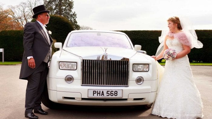 Mr and Mrs Cooney with the Rolls-Royce Phantom