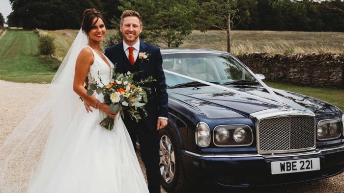 Fawn and Olly with the Bentley Arnage wedding car in Blue