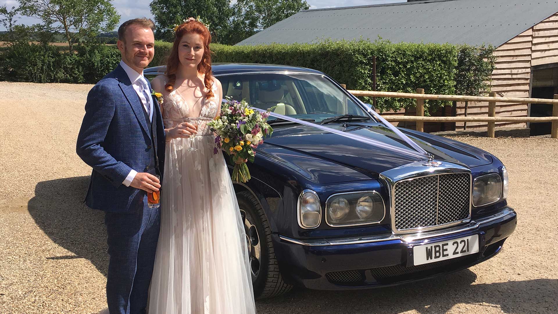 Olivia and Adam with the Bentley Arnage wedding car in Blue