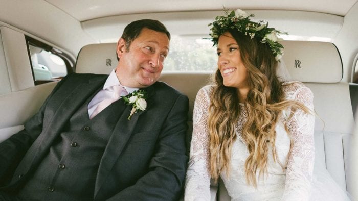 Becky and her father in the Rolls-Royce wedding car