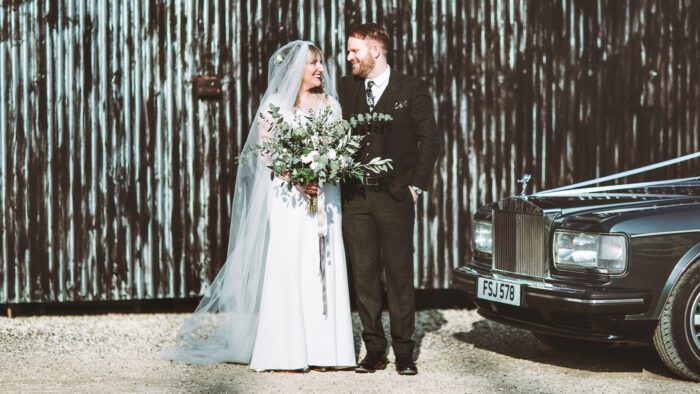 Emily-Kate and Joe at Cripps Barn with the Rolls-Royce Flying Spur wedding car