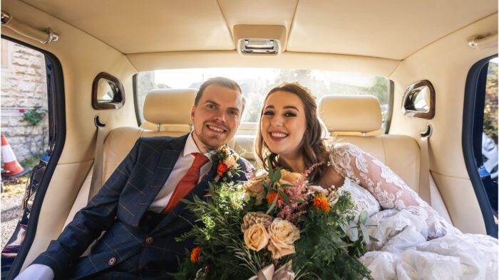 Newly-wed couple Cassie and Ed in the Bentley Arnage luxury wedding car